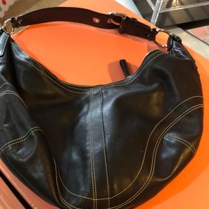 Black leather coach